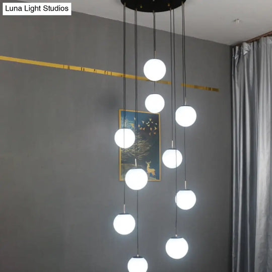 Modernist Cream Glass Ball Pendant Light With 10 Black Suspension Lamps - Perfect For Living Room /