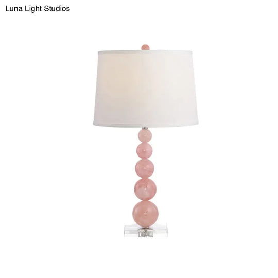 Modernist Fabric Barrel Shade Nightstand Lamp: Single White Table Light With Pink Glass Orb Stand