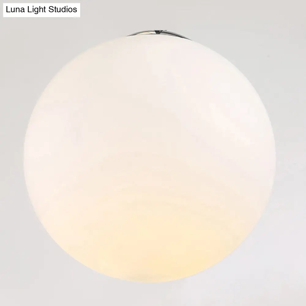 Modernist Glass Multi Light Pendant For Living Room With Orb Cream Shade And White Suspension