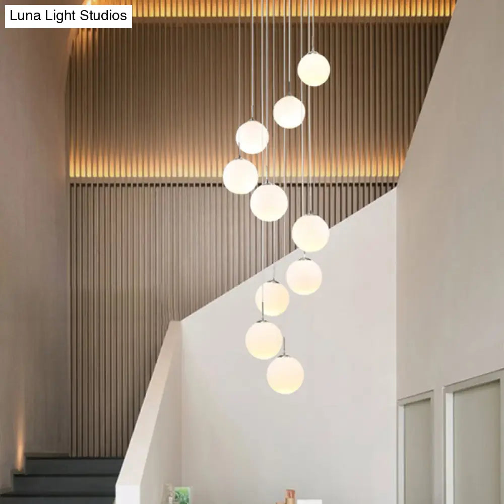 Modernist Glass Multi Light Pendant For Living Room With Orb Cream Shade And White Suspension