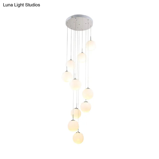 Modernist Glass Multi Light Pendant For Living Room With Orb Cream Shade And White Suspension