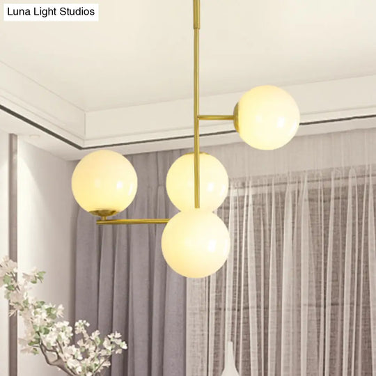 Modernist Gold Ball Pendant Chandelier With Milky Glass Shade - 4 Heads Ceiling Hanging Light