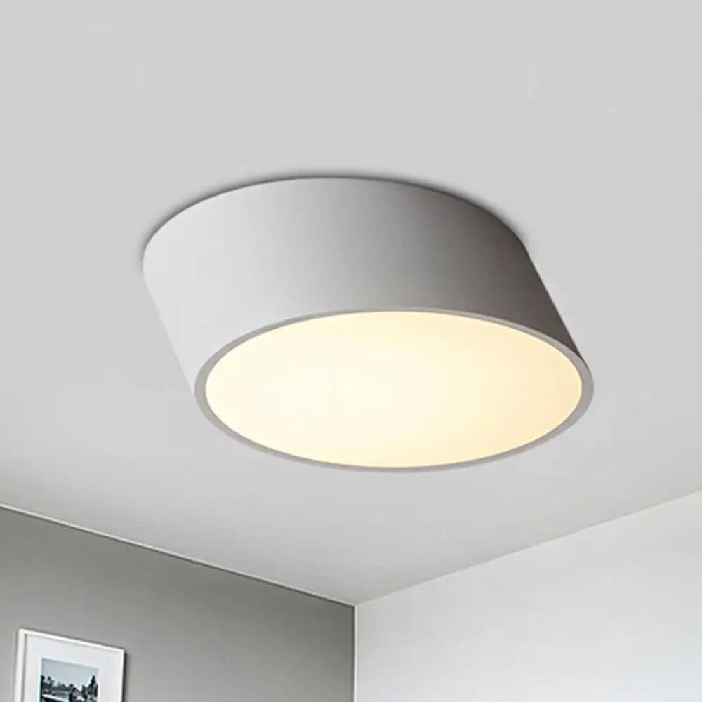 Modernist Led Bedroom Flush Mount Light In White/Black Inclined Elliptical Design