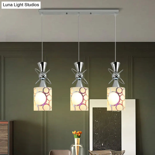 Modernist Metal Hourglass Multi Pendant Ceiling Light With Chrome Finish And Patterned Glass Shade