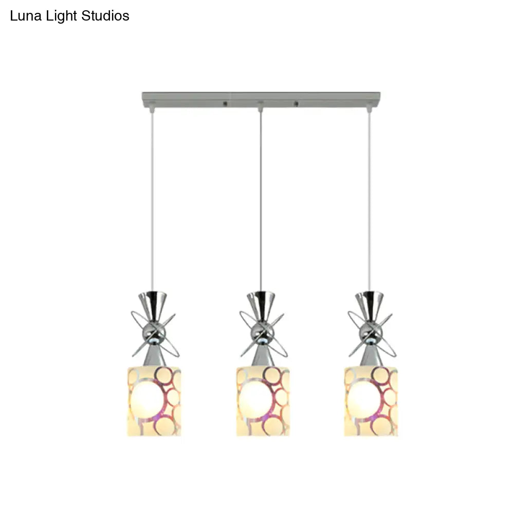 Modernist Metal Hourglass Multi Pendant Ceiling Light With Chrome Finish And Patterned Glass Shade