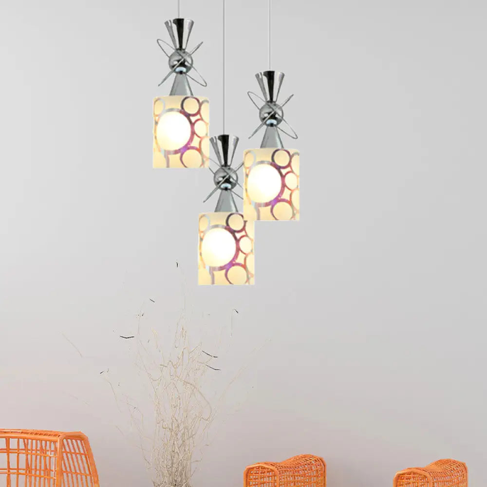 Modernist Metal Hourglass Multi Pendant Ceiling Light With Chrome Finish And Patterned Glass Shade