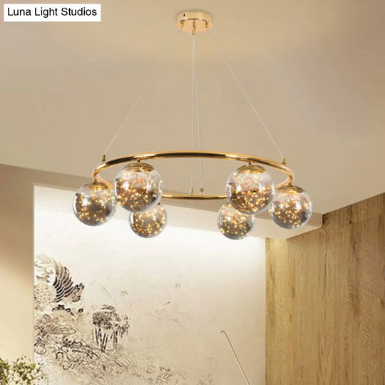 Modernist Smoke Gray Glass Ball Chandelier - 6 Head Brass Ring Pendant Light With Unique Glowworm