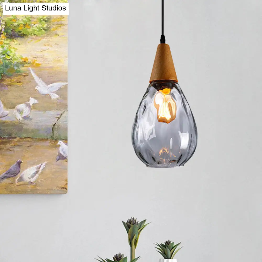 Modernist Style Teardrop Pendant Lamp With Dimpled Glass - 6’/8’ Wide Amber/Clear 1 Light