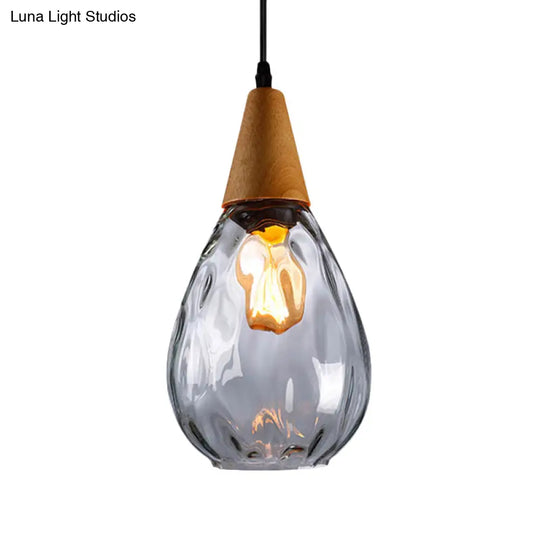 Modernist Style Teardrop Pendant Lamp With Dimpled Glass - 6’/8’ Wide Amber/Clear 1 Light