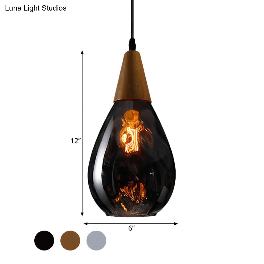 Modernist Style Teardrop Pendant Lamp With Dimpled Glass - 6’/8’ Wide Amber/Clear 1 Light