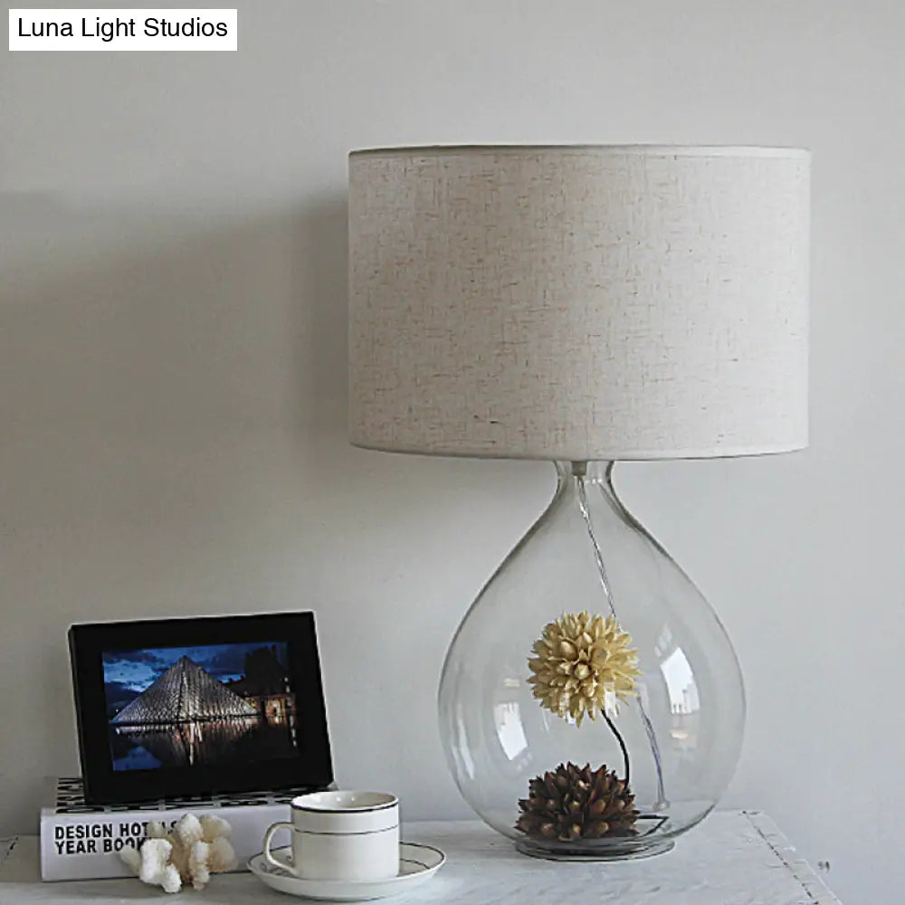 Pastoral Fabric Drum Table Lamp With Clear Glass Base - Cream Gray 1-Head Night Light Dried Flower