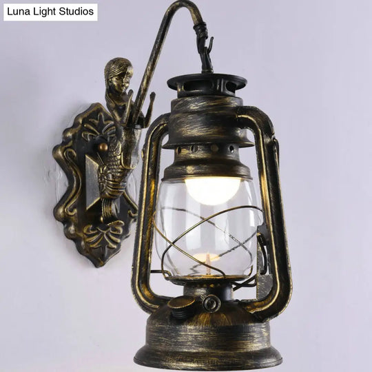 Nautical Clear Glass Kerosene Wall Sconce With Curved Arm For Restaurants