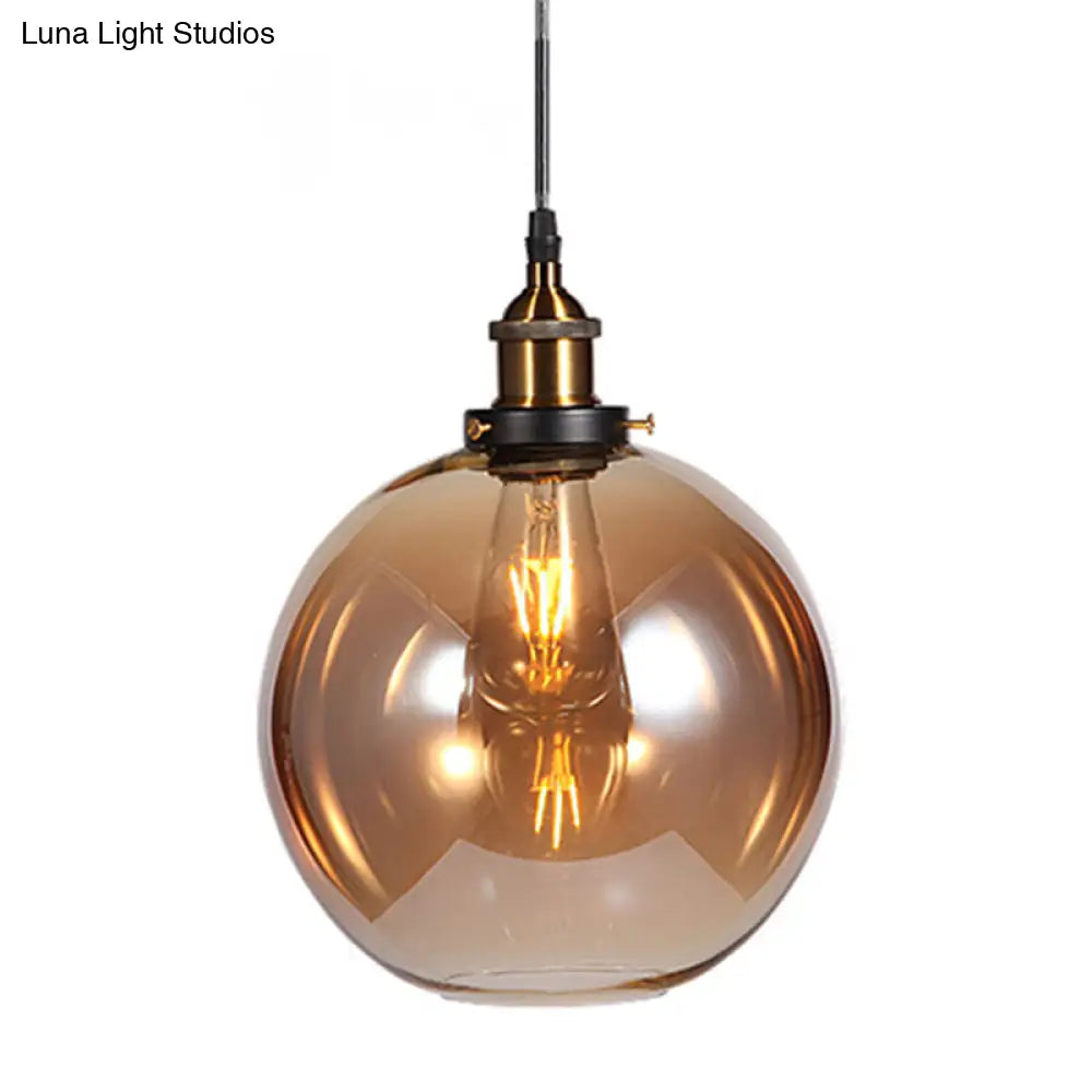 Sleek Glass Nautical Pendulum Light - Modern Geometric Dining Room Pendant Amber / Globe