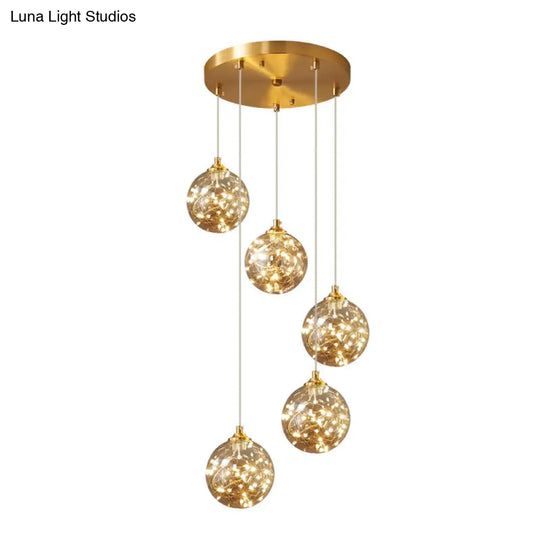 Nordic Amber Glass Led Pendant Lamp With Brass Finish And Starry Design For Bedroom