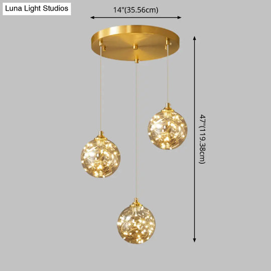 Amber Glass Led Pendant Lamp With Brass Finish - Nordic Style Lighting For Bedroom