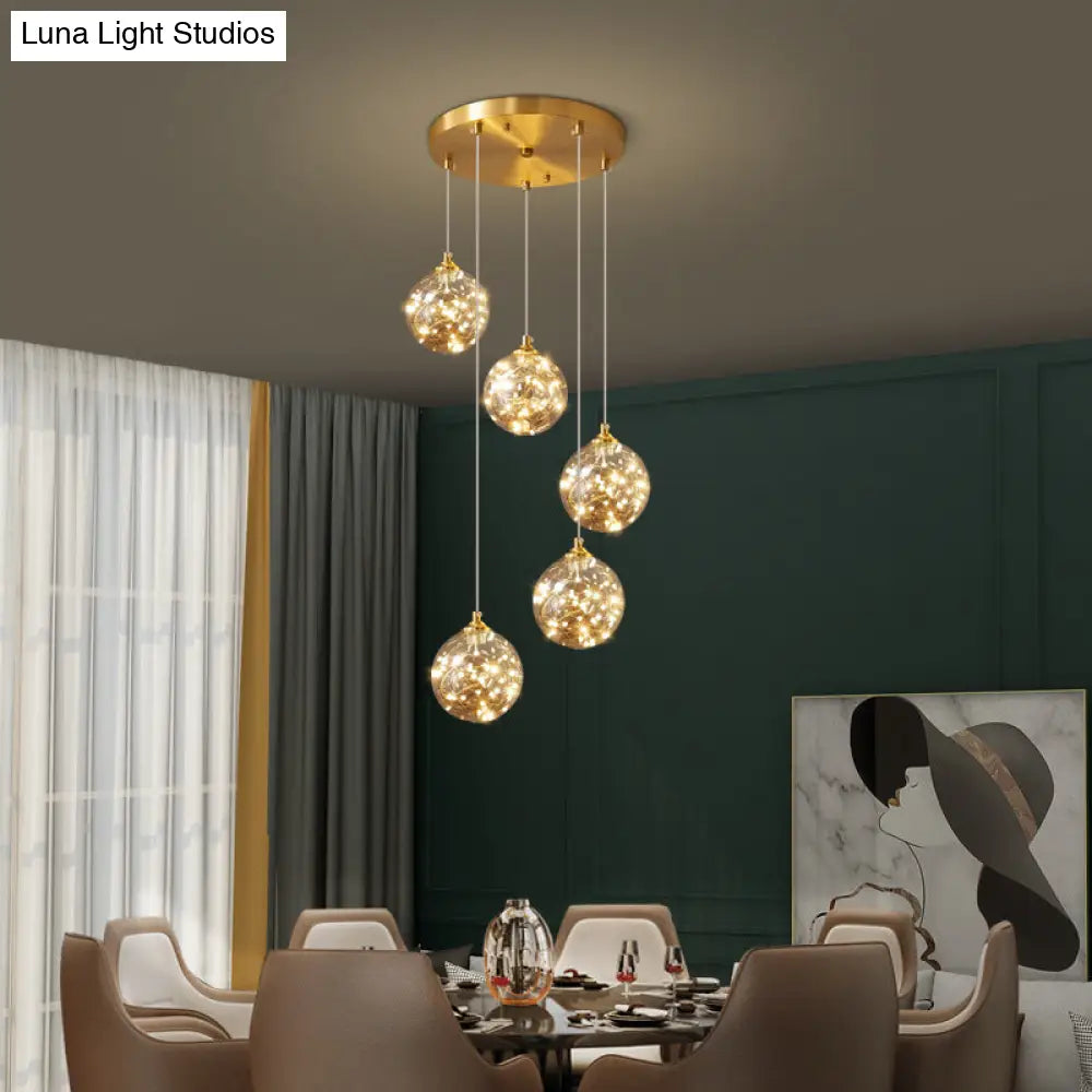 Nordic Amber Glass Led Pendant Lamp With Brass Finish And Starry Design For Bedroom