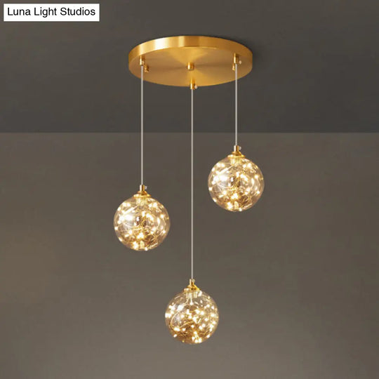 Amber Glass Led Pendant Lamp With Brass Finish - Nordic Style Lighting For Bedroom