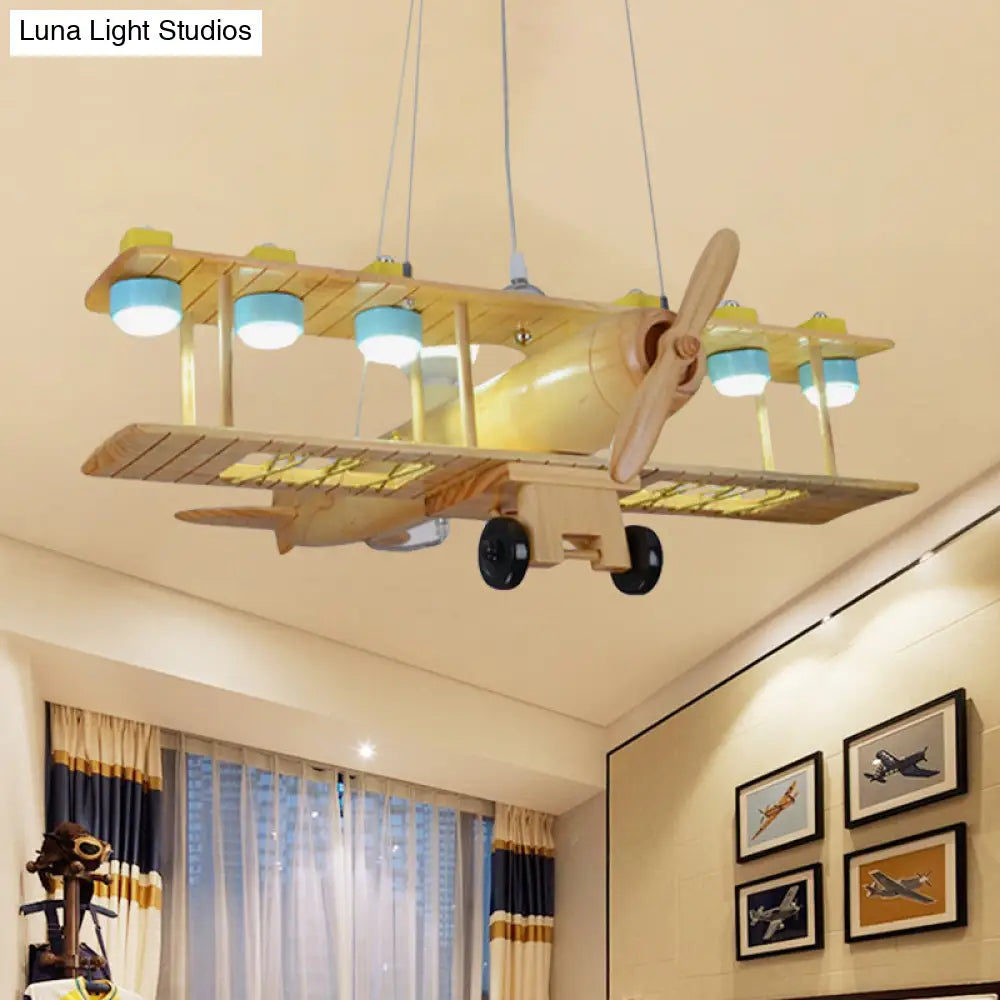 Nordic Beige Wood Pendant Light: Glider Shaped Hanging Light For Kindergarten