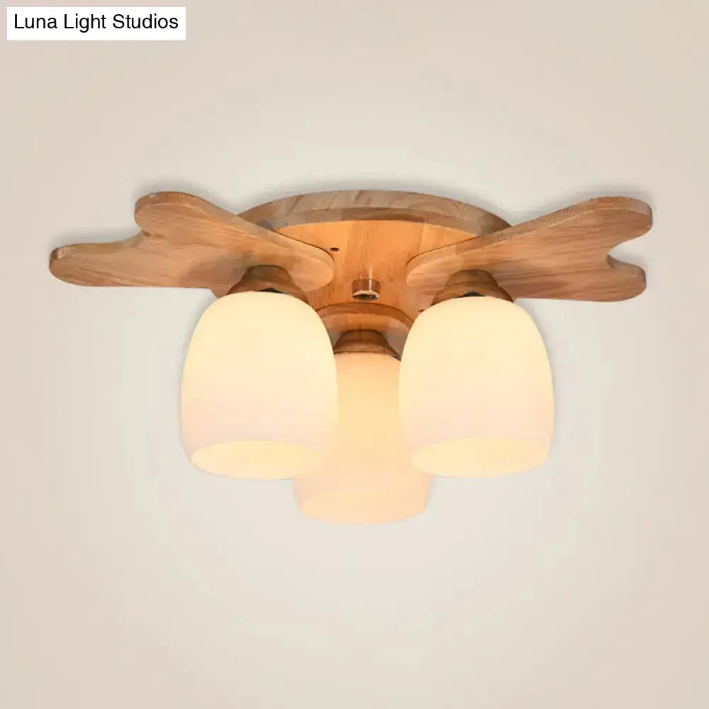 Nordic Cream Glass Bell Flush Ceiling Light With Antler Top And Wood Accents