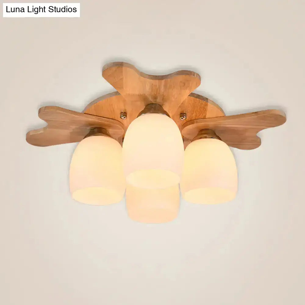 Nordic Cream Glass Bell Flush Ceiling Light With Antler Top And Wood Accents