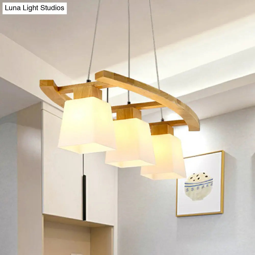 Nordic Wood Island Pendant Ceiling Light With Trapezoid White Glass Shade - 3-Light Dining Room