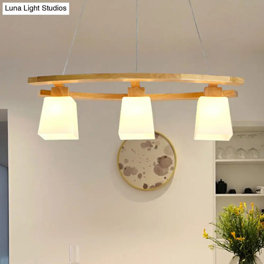 Nordic Wood Island Pendant Ceiling Light With Trapezoid White Glass Shade - 3-Light Dining Room