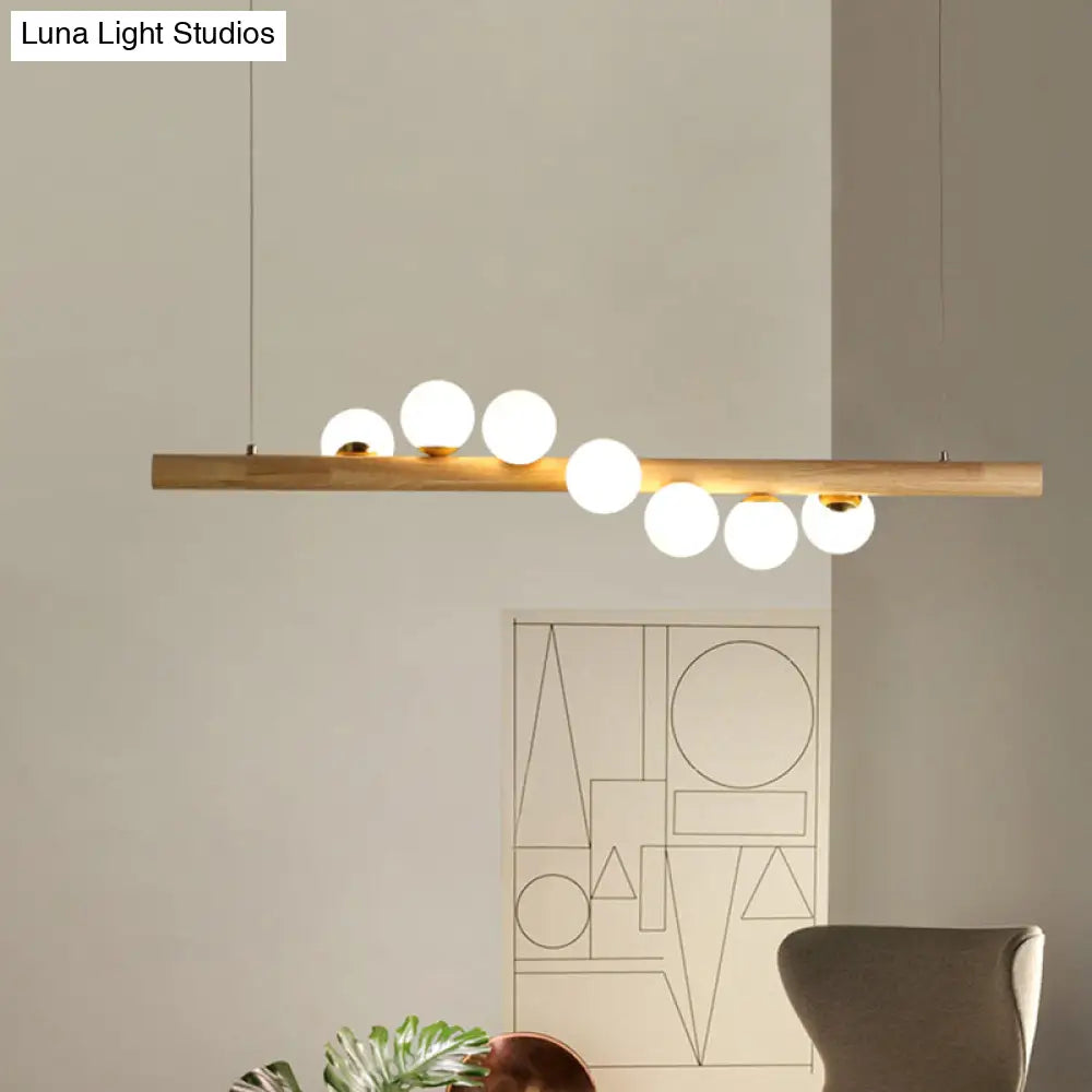 Nordic Wood Island Pendant With Globe Glass Light For Dining Room In Beige