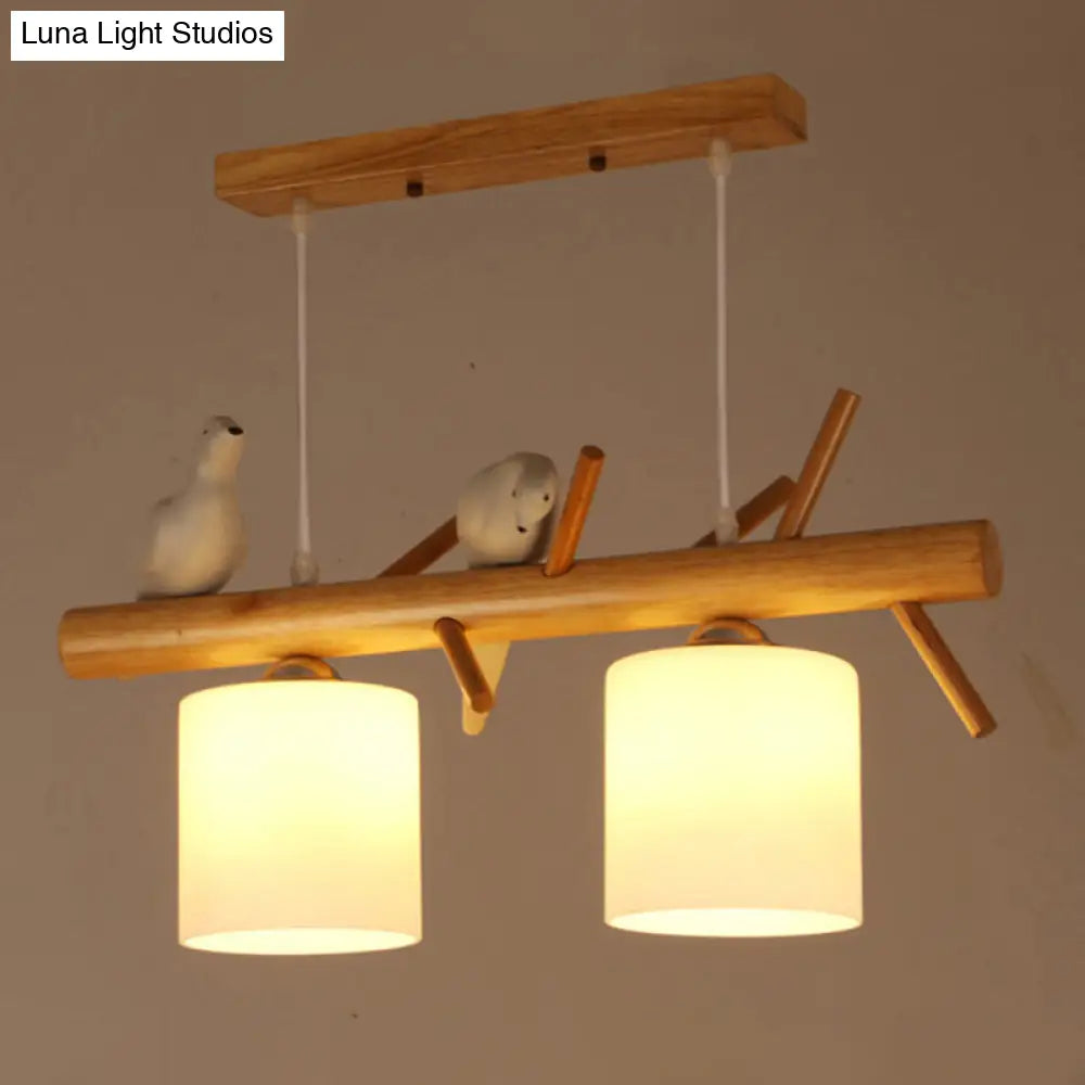 Nordic Wood Pendant Light With Opal Glass Cylinder And Resin Bird Decor