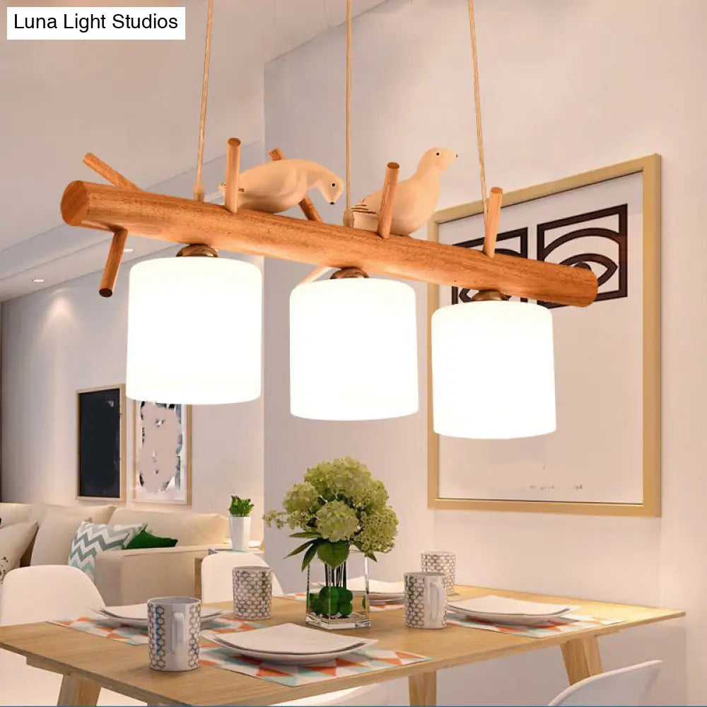 Nordic Wood Pendant Light With Opal Glass Cylinder And Resin Bird Decor