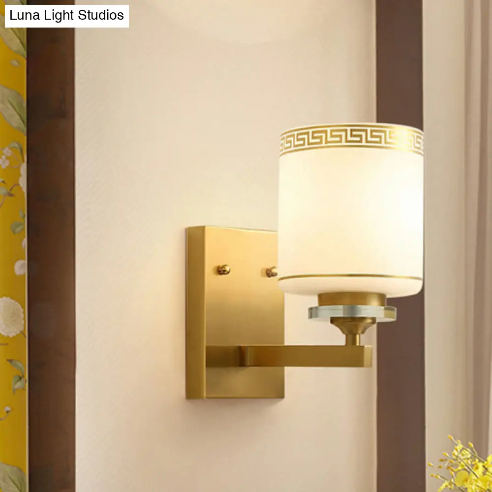 Opal Frosted Glass Wall Sconce In Gold Traditional Swastika Design