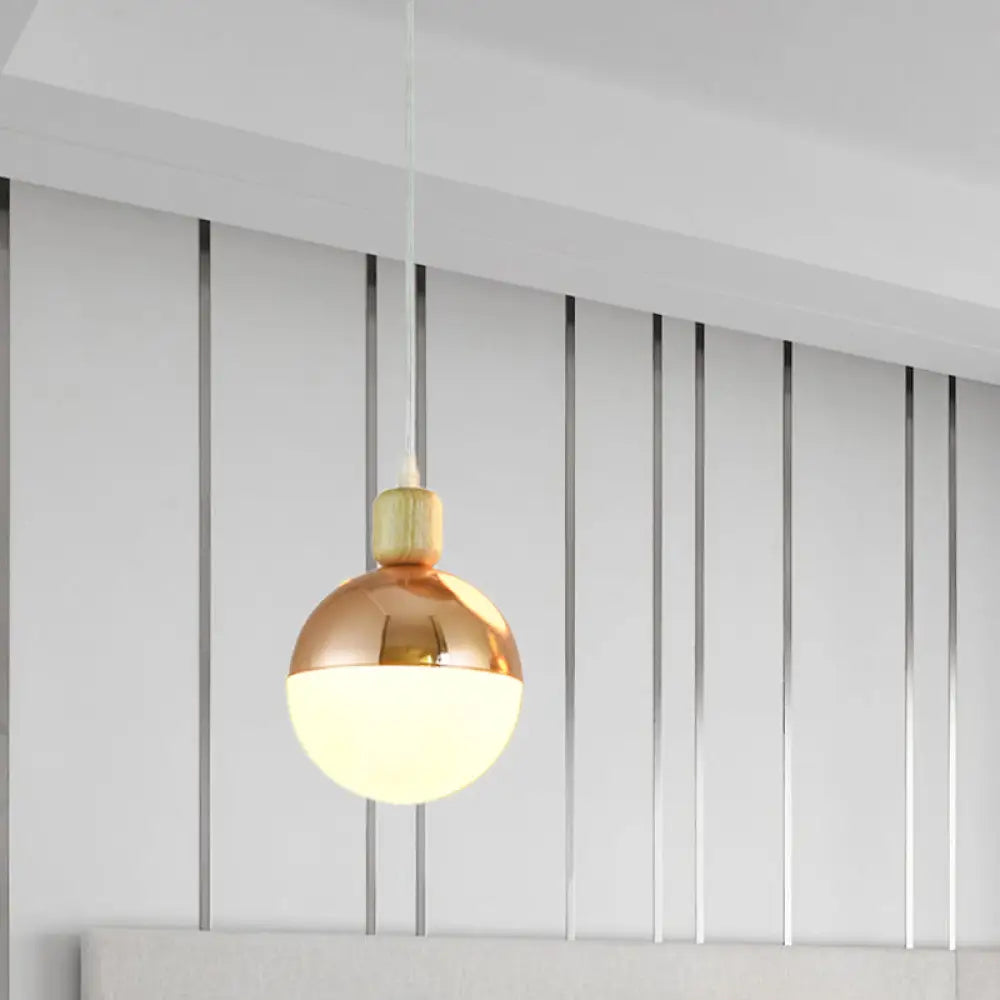 Opal Glass Bedside Pendant Lamp In Modern Gold Sphere Design’ This Revised Title Maintains The