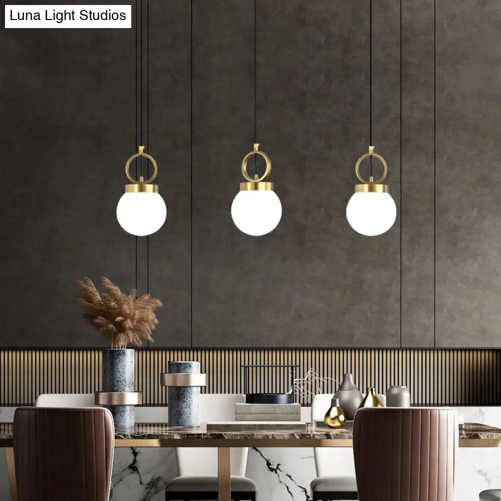 Opal Glass Dining Room Pendant Lamp With Elegant Gold Ring Top - Simplistic Ball Pendulum Light
