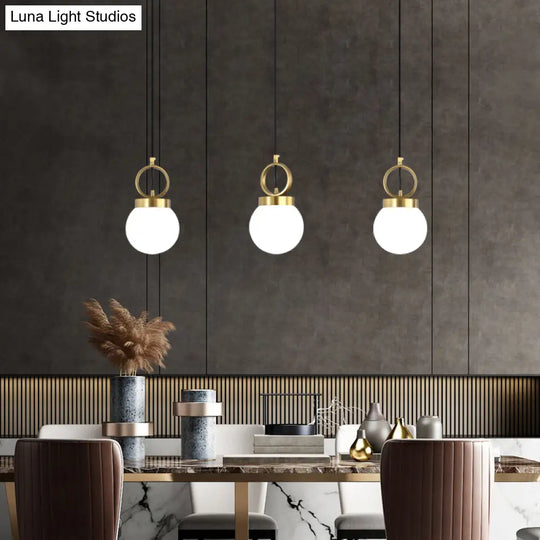 Opal Glass Dining Room Pendant Lamp With Elegant Gold Ring Top - Simplistic Ball Pendulum Light