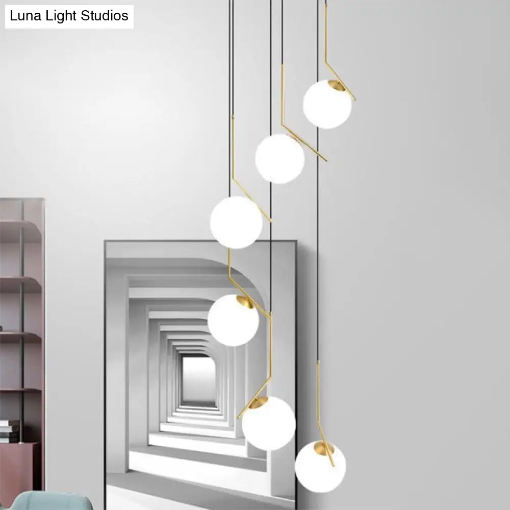 Opal Glass Multi-Light Pendant In Gold For Stylish Staircase Lighting