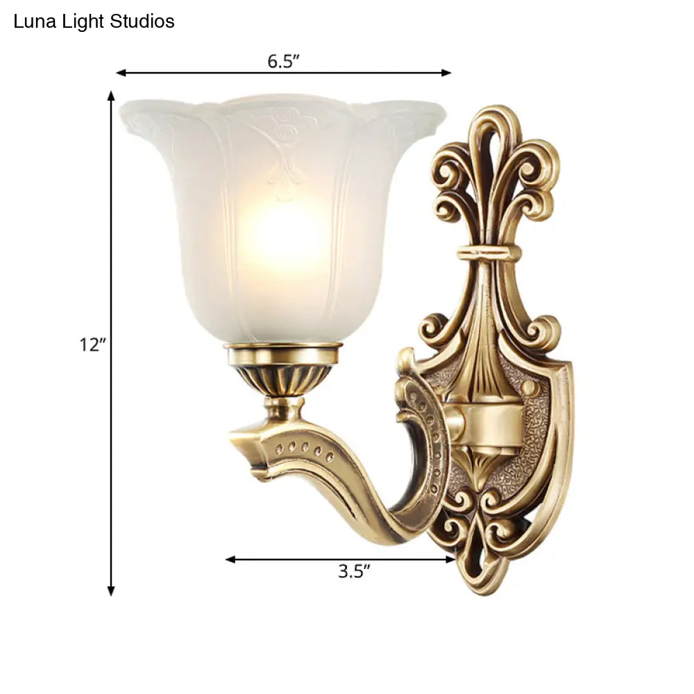 Opal Glass Petal Wall Light With Carved Brass Finish