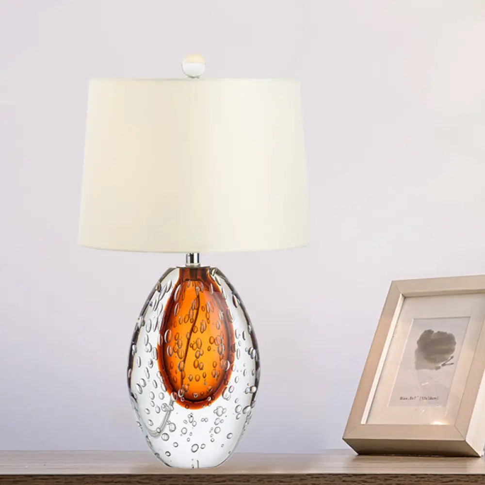 Oval Desk Lamp With Clear Bubble Glass Ideal For Bedroom Or Night Table Modern Design In White