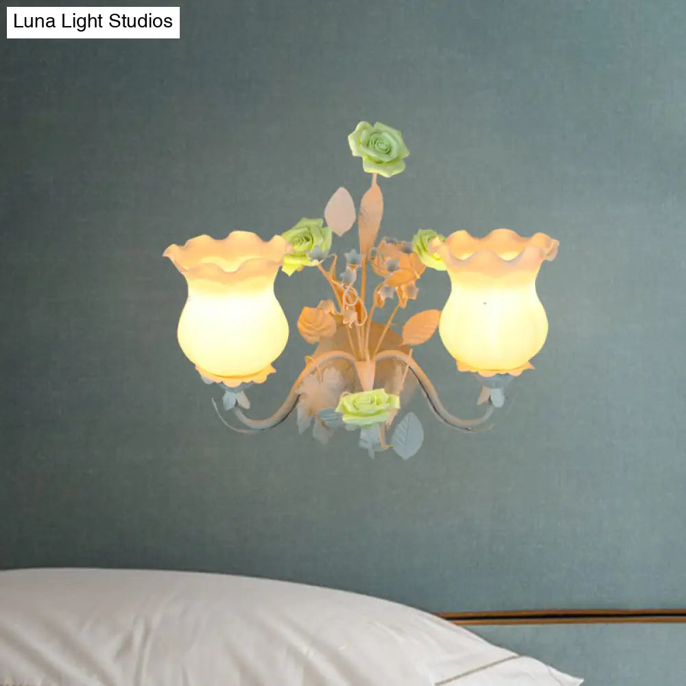 Pastoral Metal Curvy Arm Bedroom Sconce Light: 2-Head Flower Wall Lighting Fixture