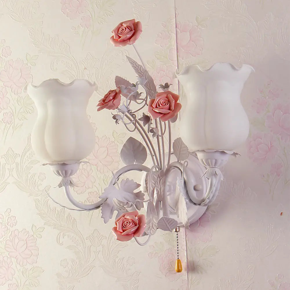 Pastoral Metal Curvy Arm Bedroom Sconce Light: 2-Head Flower Wall Lighting Fixture