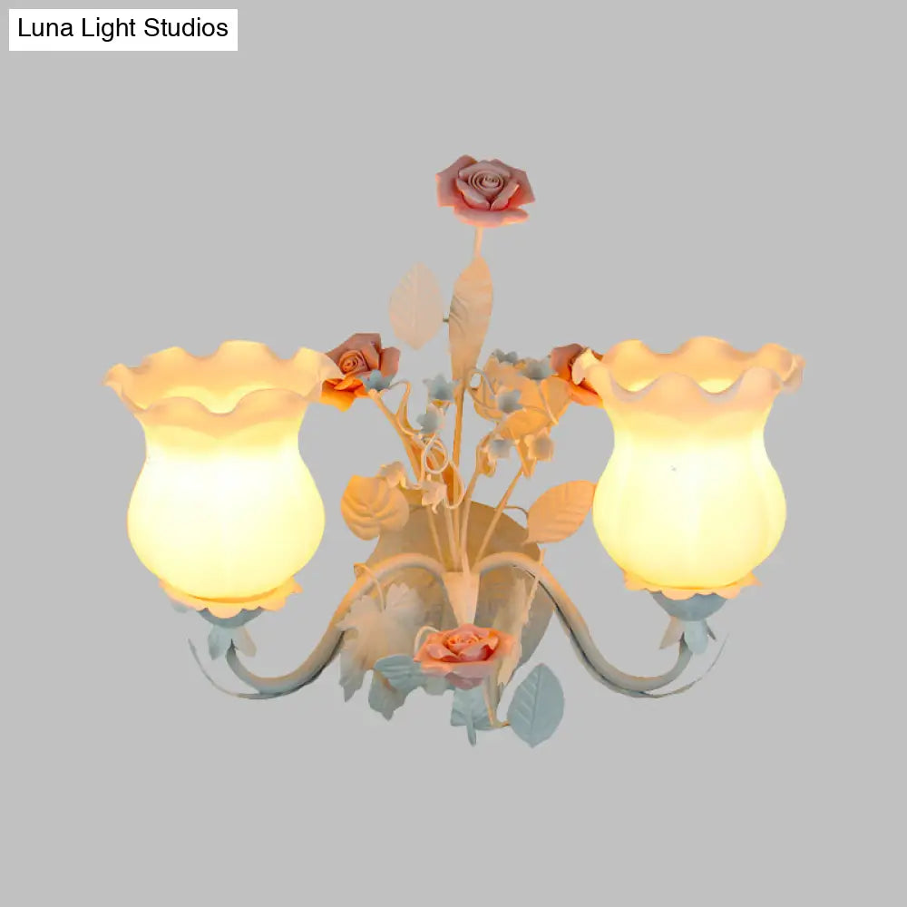 Pastoral Metal Curvy Arm Bedroom Sconce Light: 2-Head Flower Wall Lighting Fixture