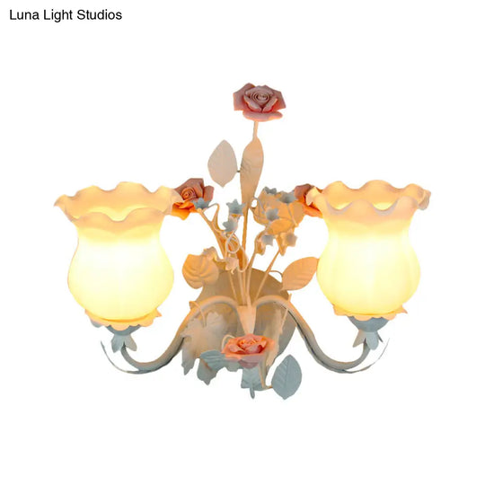 Pastoral Metal Curvy Arm Bedroom Sconce Light: 2-Head Flower Wall Lighting Fixture