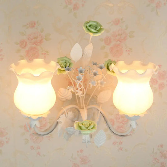 Pastoral Metal Curvy Arm Bedroom Sconce Light: 2-Head Flower Wall Lighting Fixture