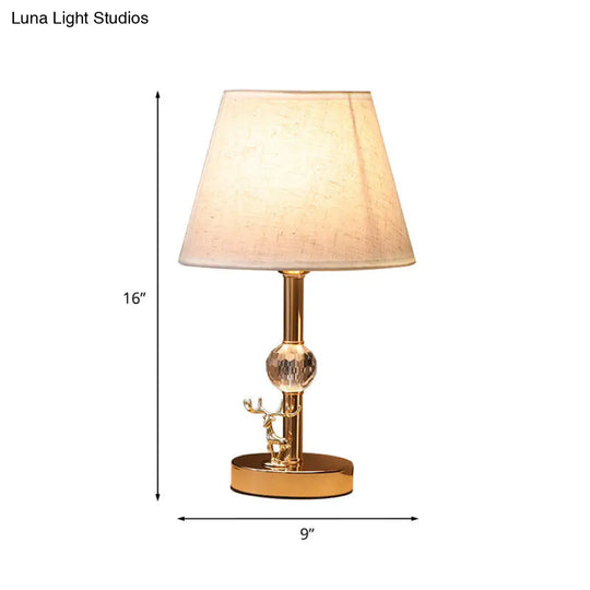 Minimalist Gold Cone Table Lamp With Fabric Shade And Crystal Deer Decoration