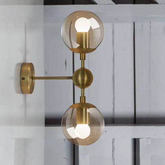 Post Modern Amber Glass Globe Wall Sconce With Brass Mount - 1/2 Light 2 /