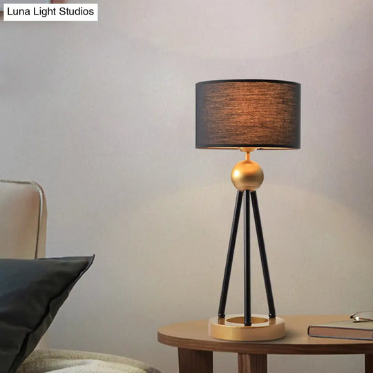 Post-Modern Black Drum Metal Table Lamp With Fabric Shade For Living Room