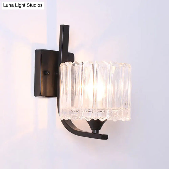 Post-Modern Black Metal Wall Mount Light With Clear Crystal Shade - Trapezoid/Flower/Drum Design