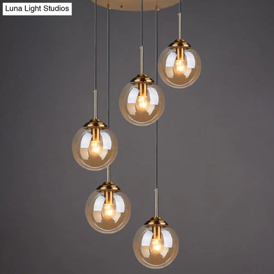 Brass Finish Cluster Ball Pendant - Post-Modern Glass Suspended Lighting Fixture With 5 Bulbs Amber