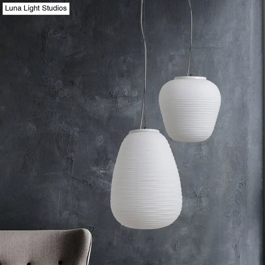 Post-Modern White Glass Cocoon Pendant Light With Ribbed Design 1-Light Ceiling Hanging Fixture