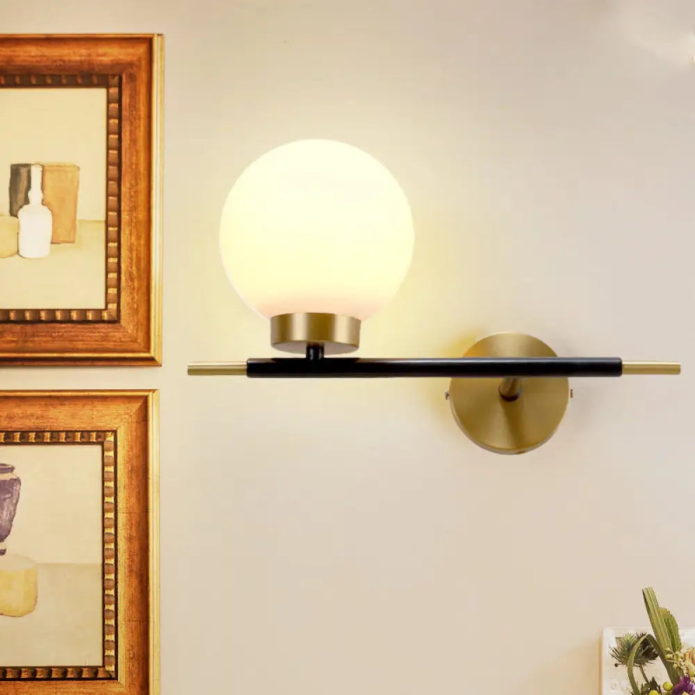 Post-Modern White Glass Sphere Wall Sconce With Brass Finish - 1/2 Bulbs 1 / Left