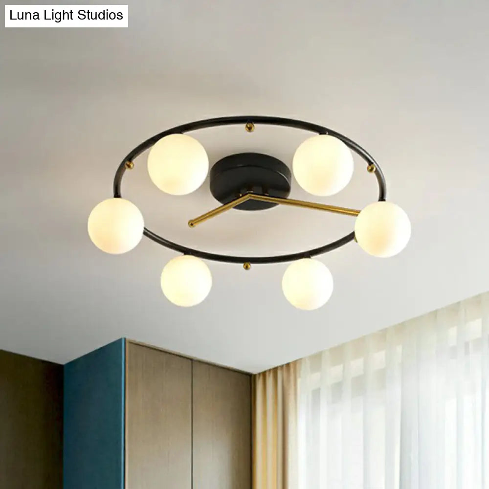 Postmodern Black & Brass 6-Head Ball Glass Ceiling Lamp: Stylish Semi Flush Mount Light