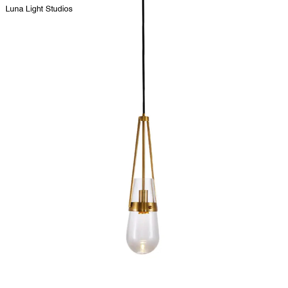 Clear/Blue Glass Pendant Lamp With Brass Gripper - Postmodern Drop Shape Dining Room Hanging Light